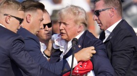 Trump tended to by Secret Service at rally in Butler, Pa.