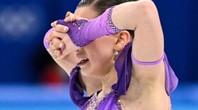 Russia's Kamila Valieva reacts after competing in the women's single skating short program at the Beijing 2022 Winter Olympic Games.