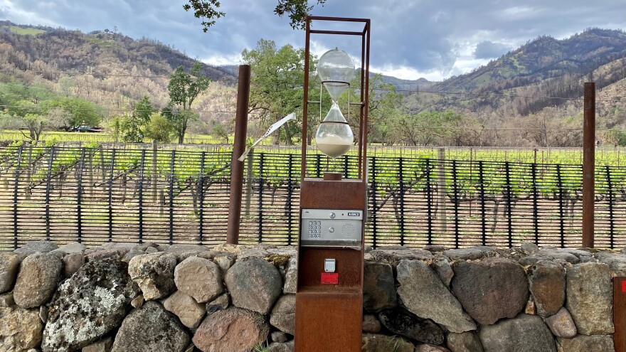 The entrance to Hourglass winery, with an evacuation tag from the Napa County Sheriff's Office from last year's Glass Fire blowing in the wind. Residents place these tags on their properties before evacuating, easing the job of first responders.