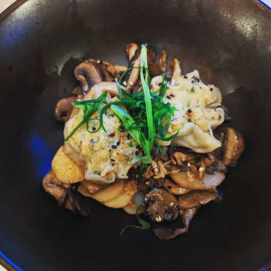 Braised Pork Belly with wild mushroom congee, red miso sweet and sour, crispy leeks