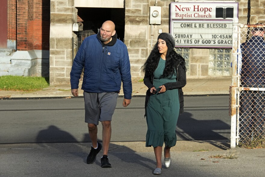 Pennsylvania Lt. Gov. John Fetterman and wife Gisele arrive to vote in Braddock, Pa, Tuesday, Nov. 8. 