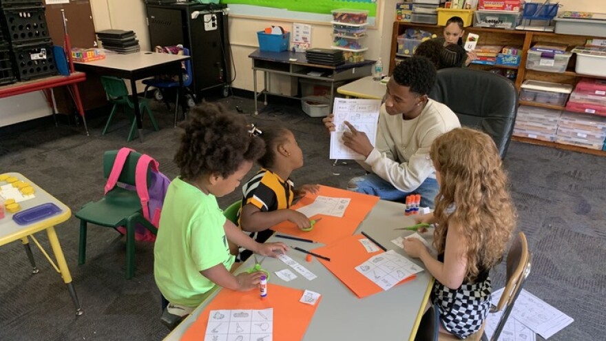 Chase McCoy help kids at Central
