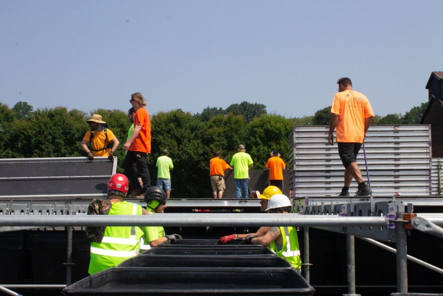 Workers building the MusikFest steel stage