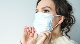 woman-in-white-face-mask-