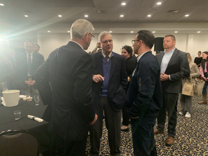 From left to right, PA Department of Agriculture Secretary Russell Redding, USDA Secretary Thomas Vilsack, and PA Gov. Josh Shapiro talk before making several agriculture announcements at the Farm Show.