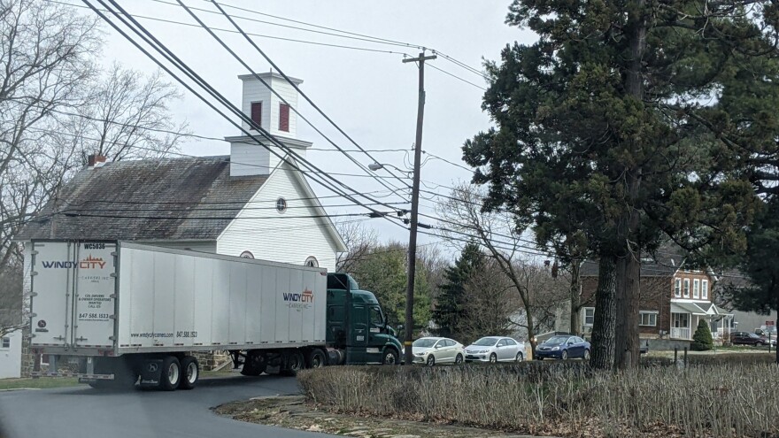 A truck on a residential road in Alburtis