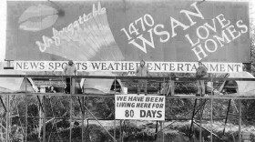 A black & white photo of the original WSAN billboard, including the three contestants.