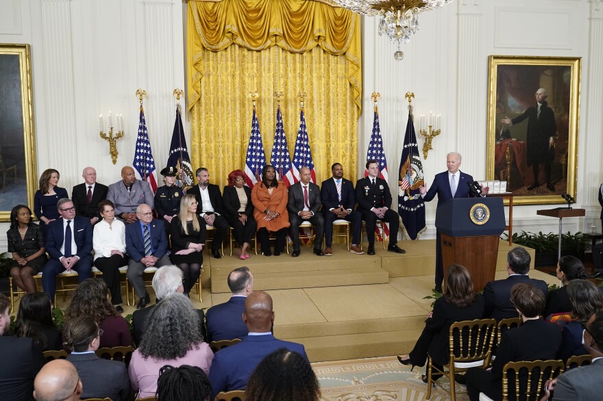 Biden speaks during a ceremony to mark the second anniversary of the Jan. 6 assault on the Capitol and to award Presidential Citizens Medals.