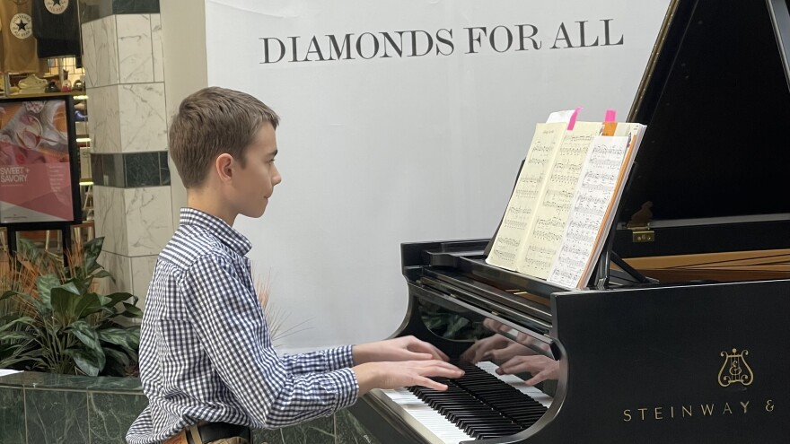 Issac Bair performs on a baby Steinway at the Lehigh Valley Mall on Saturday, Feb. 24..jpeg