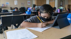 child-in-school-wearing-mask