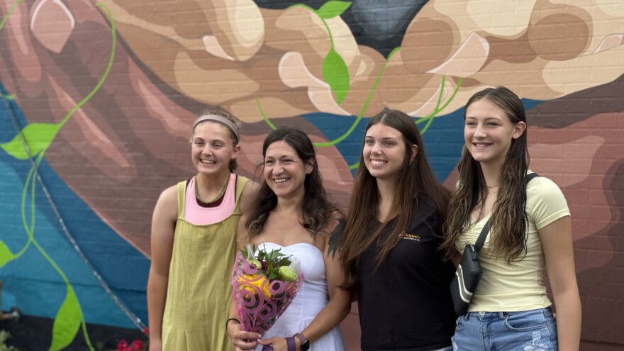 Mural artist and her students at Bethlehem unveiling