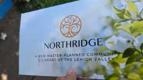 A picture of the postcard for the Northridge community open house.