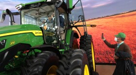 A John Deere autonomous tractor is on display at CES 2022 in Las Vegas, Nevada.