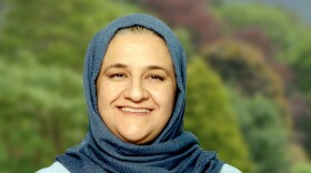 a photo of Rangina Hamidi in a blue hijab