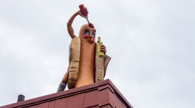 The Yocco's hotdog statue close-up.