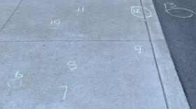 Evidence marks from police-involved shooting near Eighths
