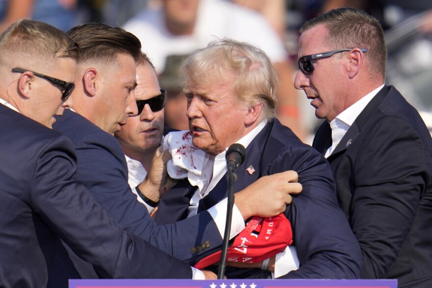 Trump tended to by Secret Service at rally in Butler, Pa.