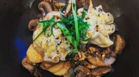 Braised Pork Belly with wild mushroom congee, red miso sweet and sour, crispy leeks