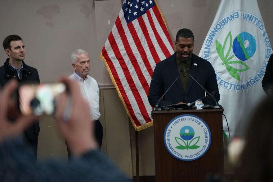 Rep. Chris DeLuzio (far left) listens to Michael Regan, the administrator of the Environmental Protection Agency, during a press conference in East Palestine.