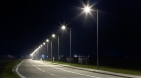 a long row of modern LED street lights