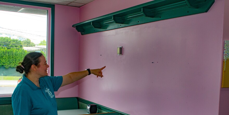 Ice Cream World missing hotdog sign crime scene