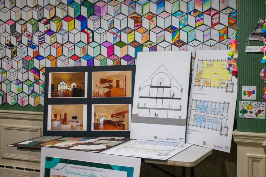 Blueprints and composite photos for BCI's new affordable housing project