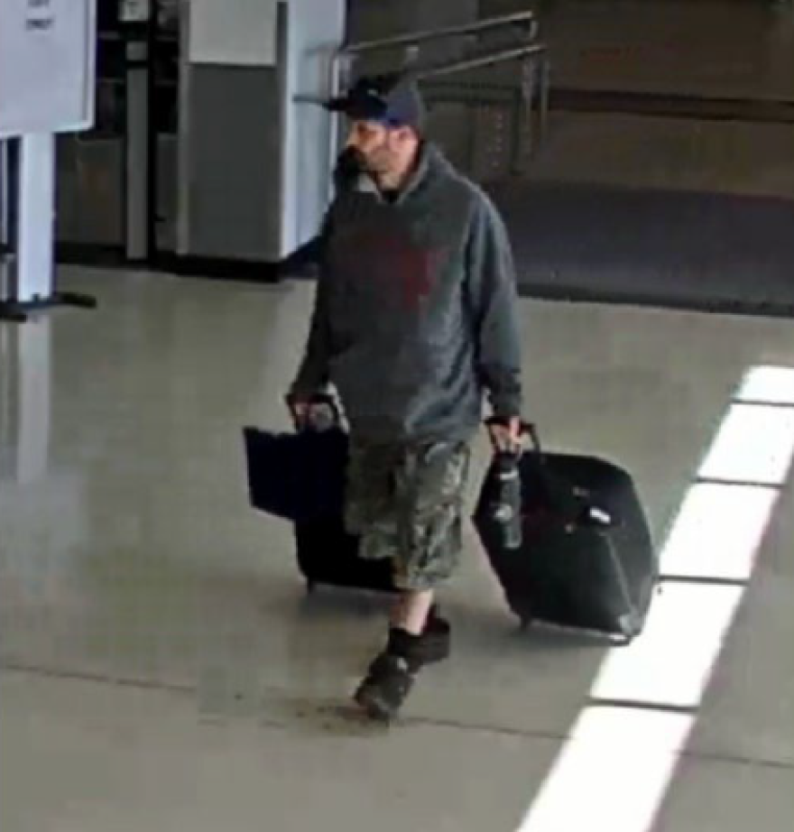 Marc Muffley with suitcases