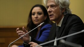 Pietro Orlandi, right, brother of Manuela, a 15-year-old daughter of a Vatican employee disappeared in 1983, is flanked by his lawyer Laura Sgro as he attends a press conference on the establishing of a parliamentary investigative commission on Manuela Orlandi and other cold cases in Rome, Tuesday, Dec. 20, 2022.