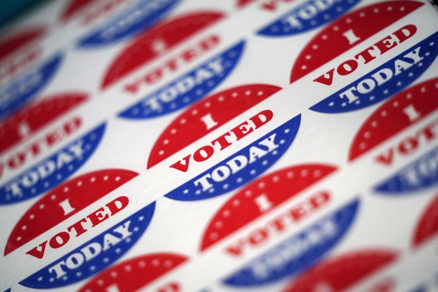 Vote stickers are seen at a satellite election office at Temple University's Liacouras Center, Tuesday, Sept. 29, 2020, in Philadelphia.