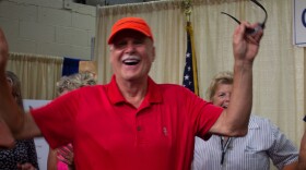 Lehigh County Executive Phillips J. Armstrong celebrating his victory at the grape stomping contest in 2023