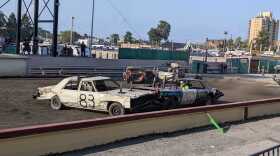 Two cars ramming each other in the Allentown Fair's demolition derby