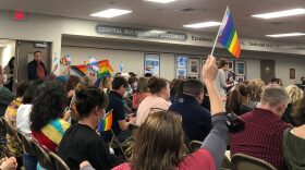 Parents and students waved LGBTQ pride flags in the air as Lena Barnhat of Doylestown said schools should not be a place for promoting sexuality.