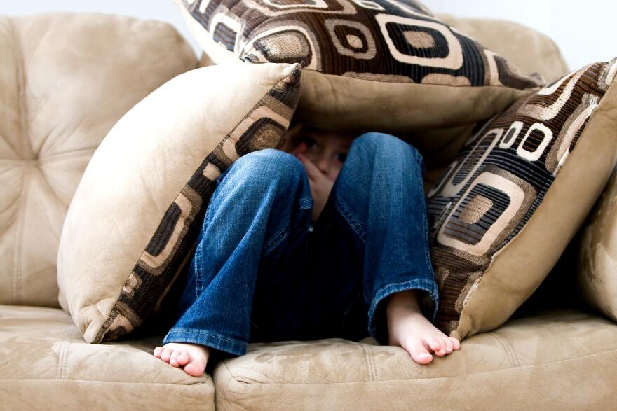 sad-child-hiding