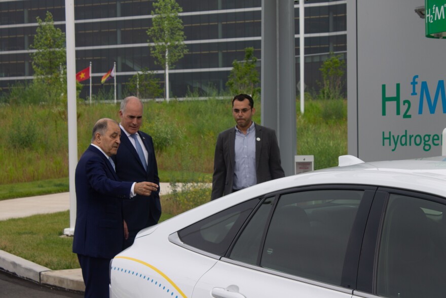 Sen. Bob Casey has a look at a hydrogen-powered Toyota at Air Products in Upper Macungie