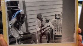 Former President Jimmy Carter holding 10-month old Allison Ayala