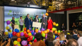 Jmad Creations founder Jonathan Maderic accepting his prize money at Startup Lehigh Valley in Bethlehem