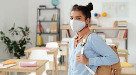child-wearing-mask-to-school