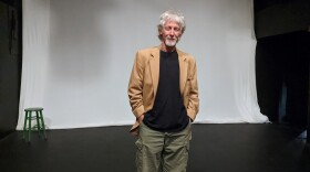 Writer and actor Bill George on the stage of Touchstone Theatre