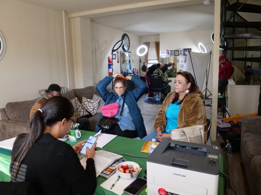 During tax season, Jiménez goes to Pedro Ferreras's barbershop every Sunday to offer walk-in tax services.