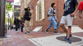 Students leave Constitution High School at the end of the school day.