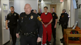 Image of the accused, Bryan Kohberger, being led into the courtroom.
