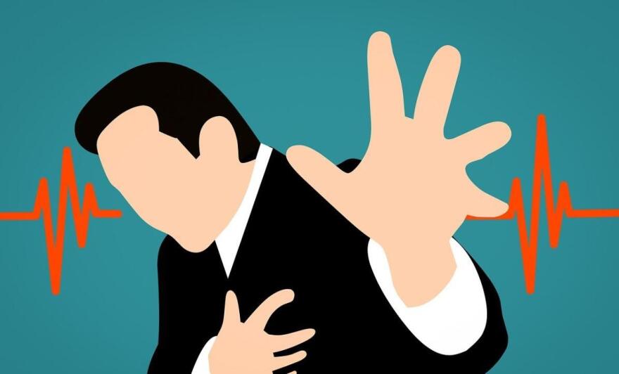 animated figure in black suite and white shirt grabbing his chest with right hand while reaching out with left hand.