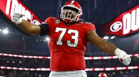 Xavier Truss of the Georgia Bulldogs celebrates with teammates after his team's first touchdown against the TCU Horned Frogs in the College Football Playoff National Championship game on Jan. 9, 2023, in Inglewood, Calif.