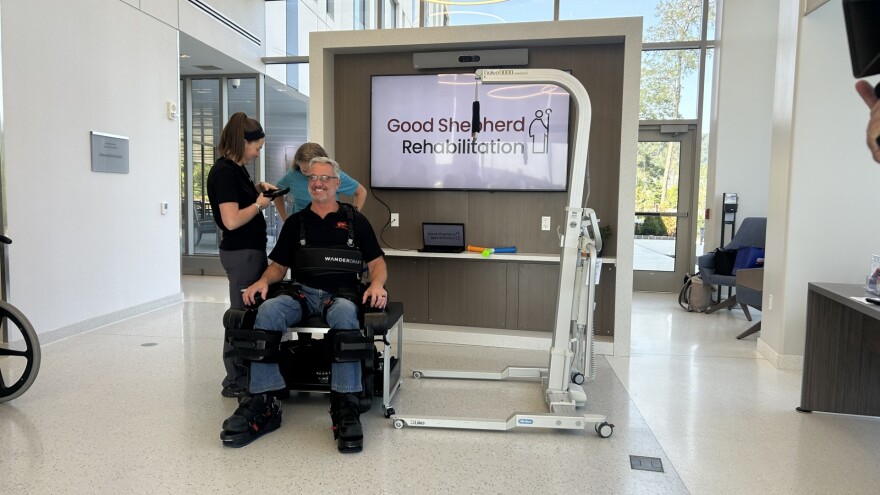 Kevin Oldt being strapped in