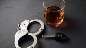 Handcuffs, alcohol and a car key