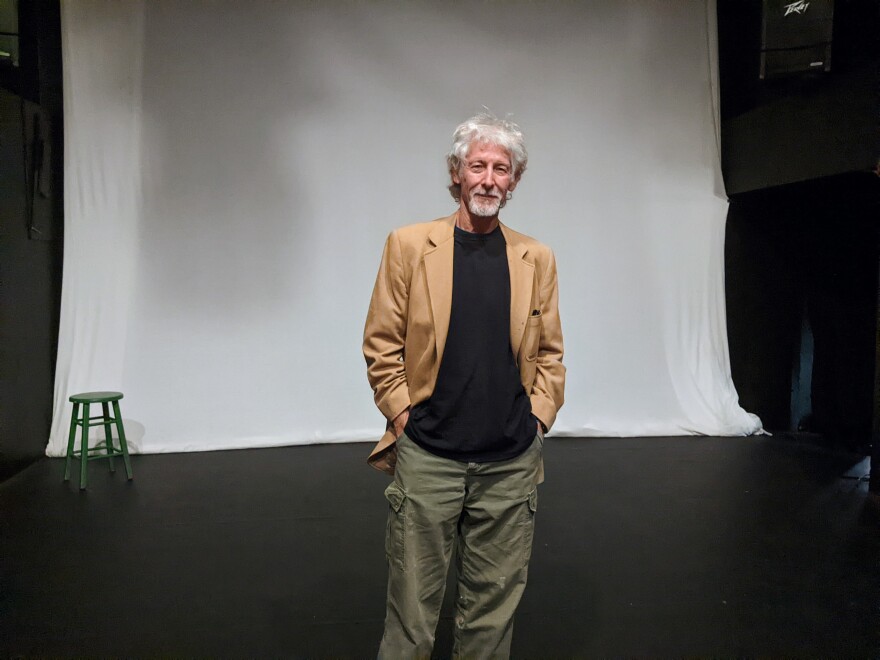 Writer and actor Bill George on the stage of Touchstone Theatre