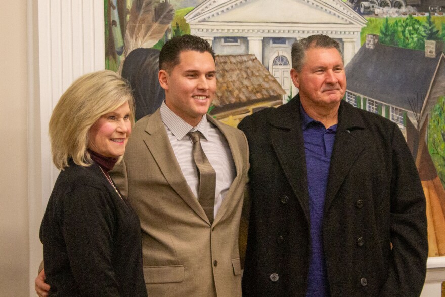 Matthew Hutchins with his mother Gloria and father Joe