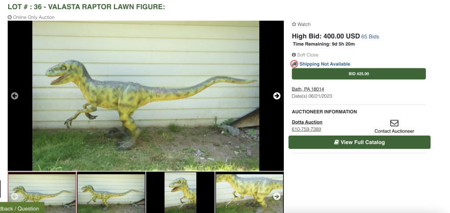 Lawn zoo velociraptor on the auction site.