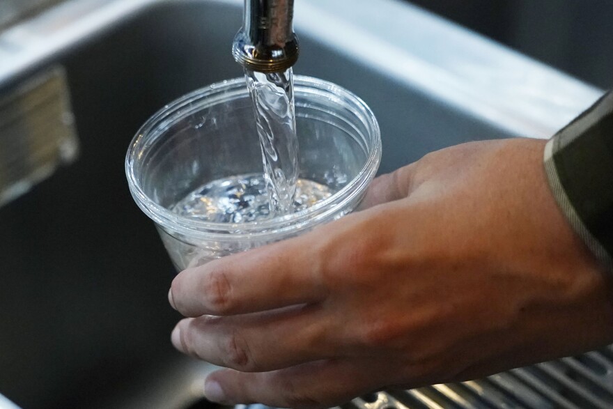 Cup of water from faucet