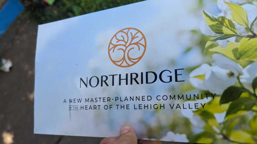 A picture of the postcard for the Northridge community open house.